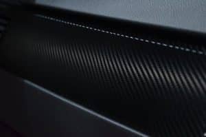 Post-Plastic Cars: Algae-Based Materials and Recycled Tech.